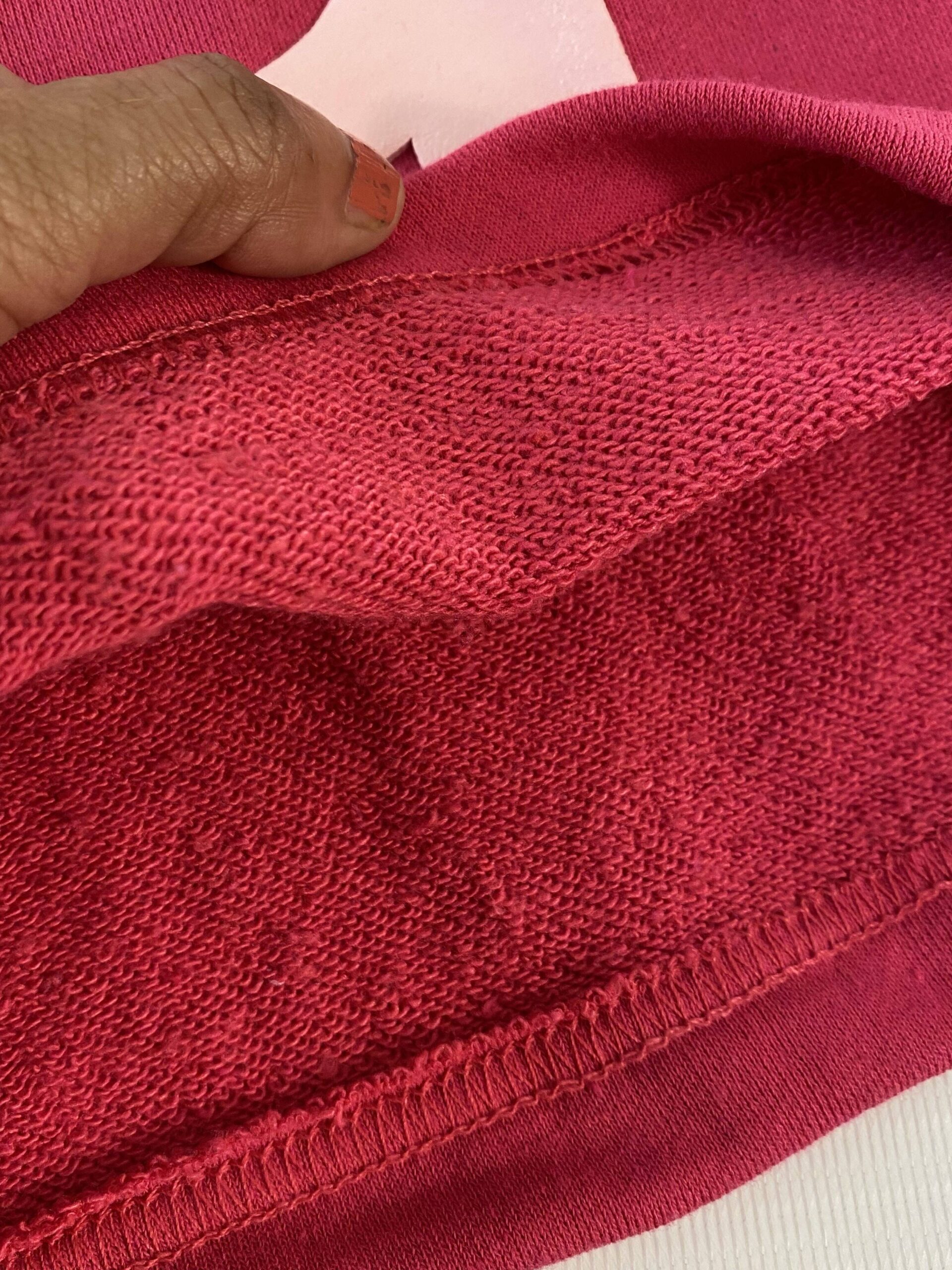 Closeup of inside stitching of shorts showing seam quality and finishing