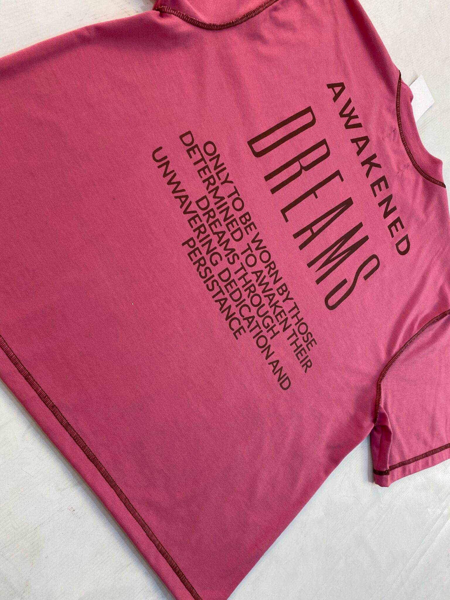 Closeup of screen printed design on back of custom t-shirt showing print quality and finish
