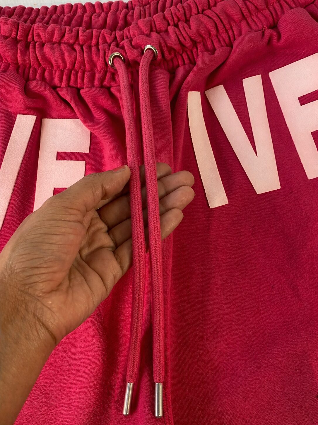 Closeup of shorts drawstring showing quality, thickness, and finishing