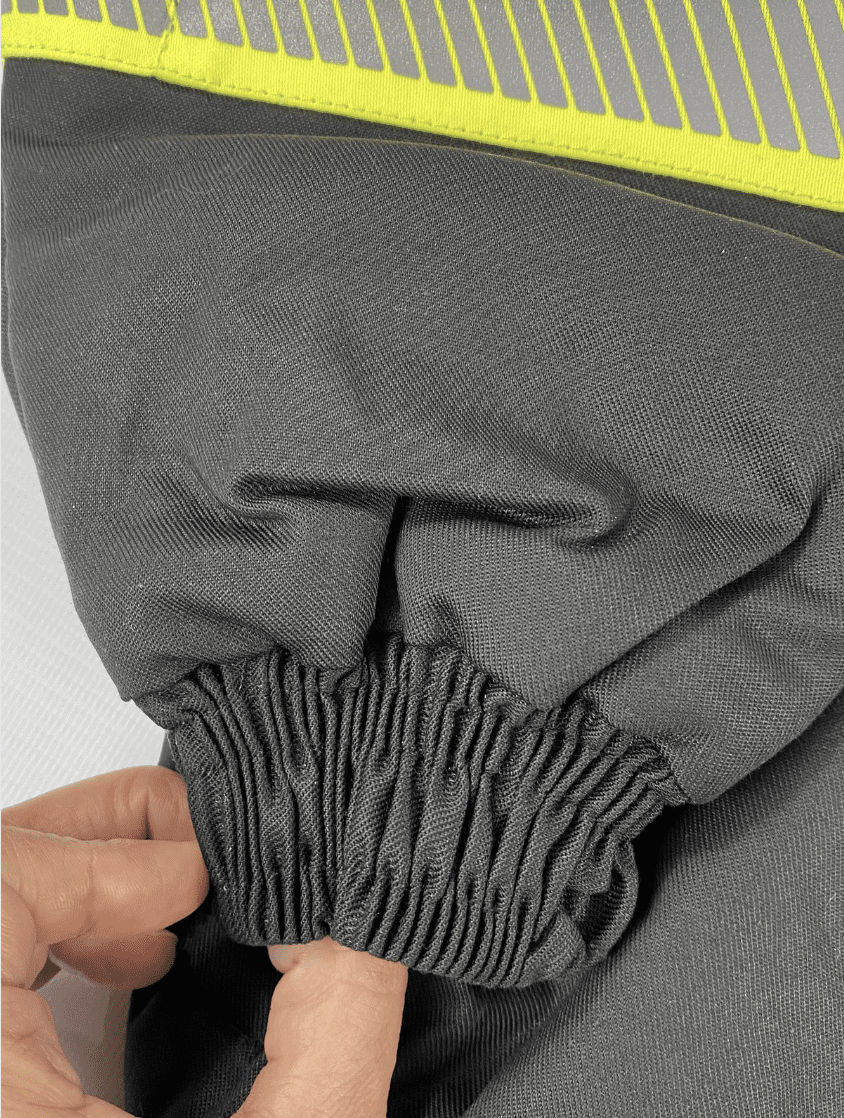 Close-up of workwear sleeves showing stitching and cuff finish