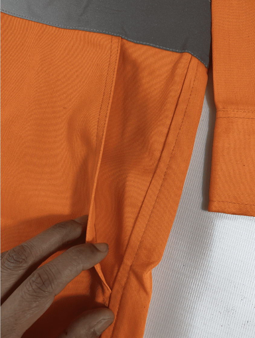 Close-up of functional pockets on industrial workwear